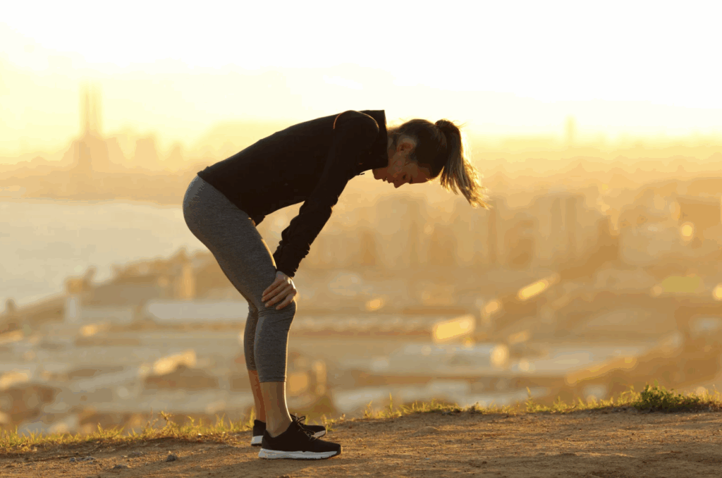 female runner exhausted after workout